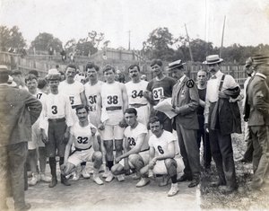Group of Greek Athletes and Felix Carbejaldesoto of Cuba Posing on Track